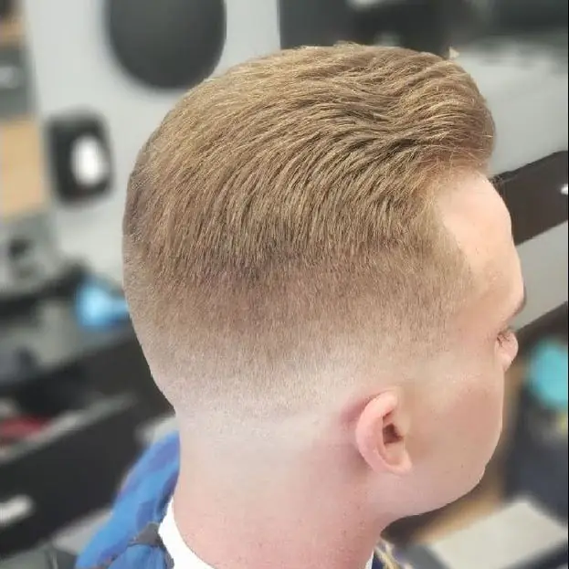 Clean taper fade on a textured crop